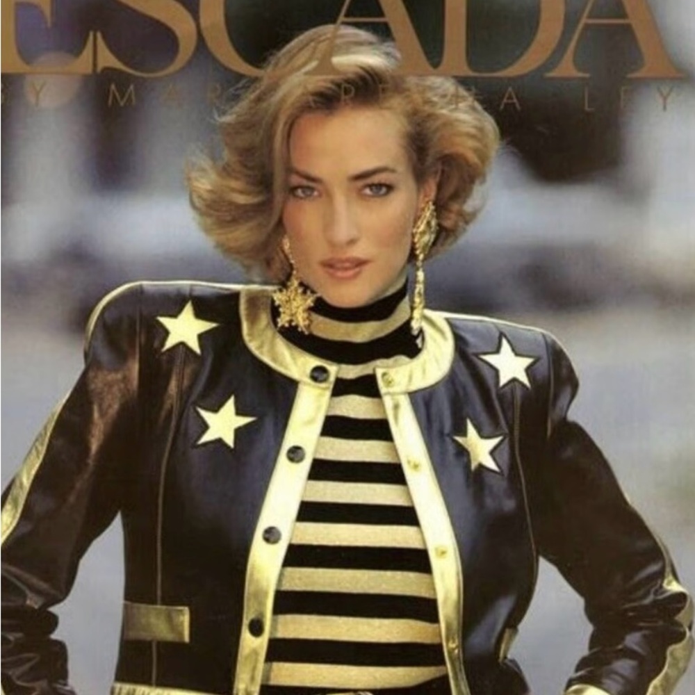 Vintage Black and Gold Leather Jacket with Star Embellishments